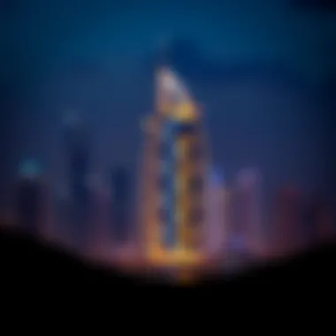 Nighttime illumination of برج الشيخة مريم بنت غانم against the Dubai skyline