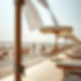 La Mer Beachfront Experience Stunning view of La Mer beachfront with sun loungers and umbrellas.