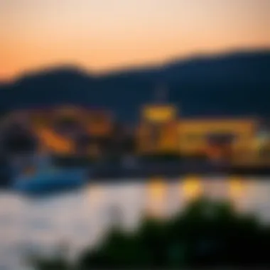 The scenic waterfront views of The Pointe illuminating at dusk