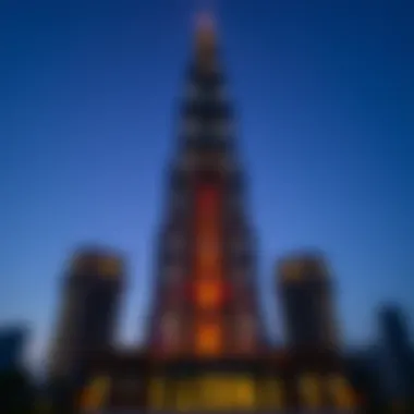Falcon Tower at dusk showcasing its illuminated facade