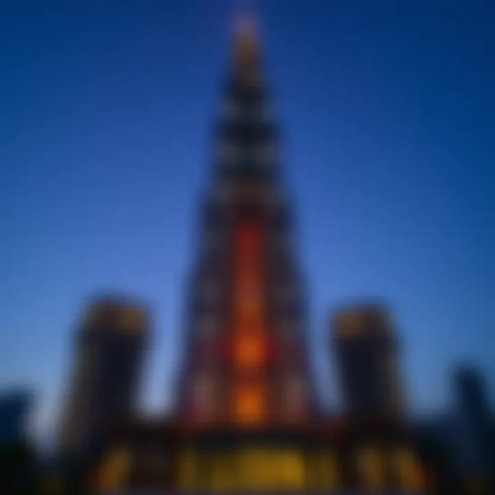 Falcon Tower at dusk showcasing its illuminated facade