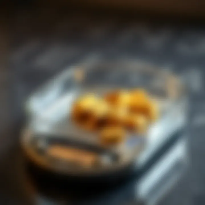 Precision in Assessing 22 ct Gold Value Close-up of a gold weighing scale with 22 ct gold pieces