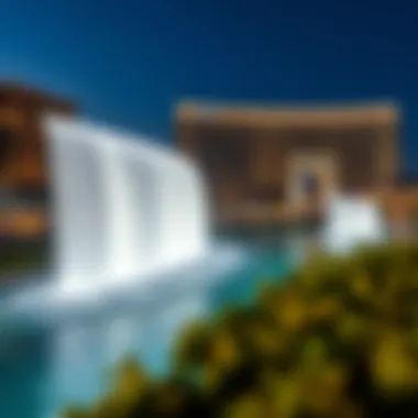 An evening shot of Jumeirah Waterfalls illuminated, reflecting its economic impact on tourism in Dubai