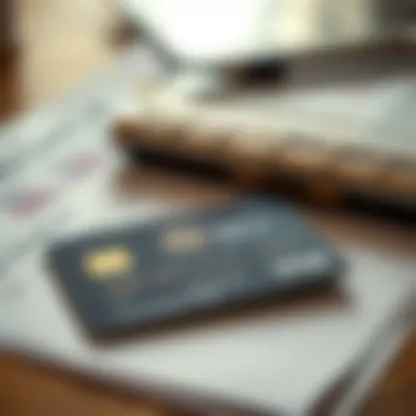 A close-up of a credit card and financial documents